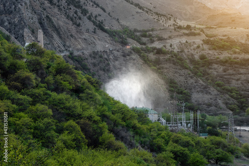 Evening view of the Gunibskaya HPP in Dagestan. Water discharge in hydroelectric power plants