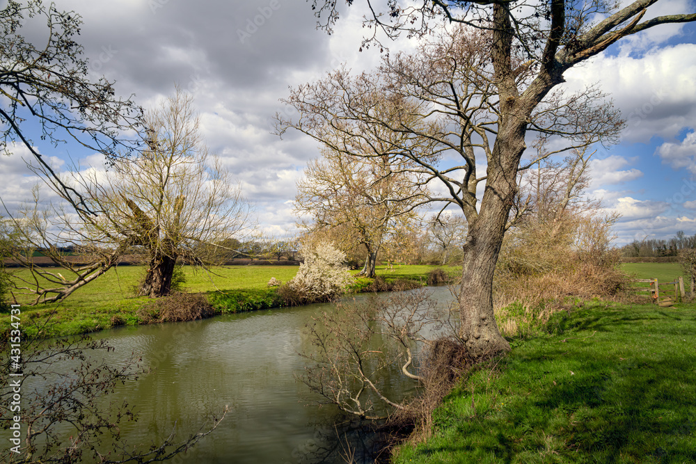 Walking on the Ouse way, Barcombe Mills, England, on a sunny spring afternoon Walking on the Ouse way, Barcombe Mills, England, on a sunny spring afternoon