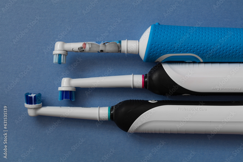 Electric toothbrush Oral-B Cross Action PRO 750 black edition and Braun Oral -B rechargeable toothbrush for kids 3+ years Disney Frozen II edition Stock  Photo | Adobe Stock