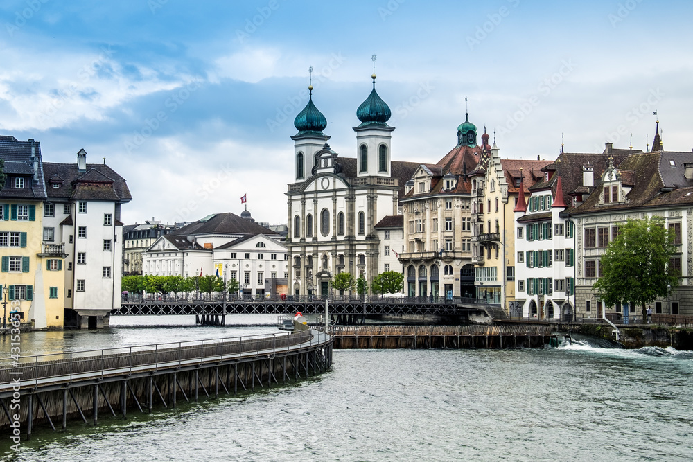 Landscape view of the old town of Luzern, with the Reuss river in the center