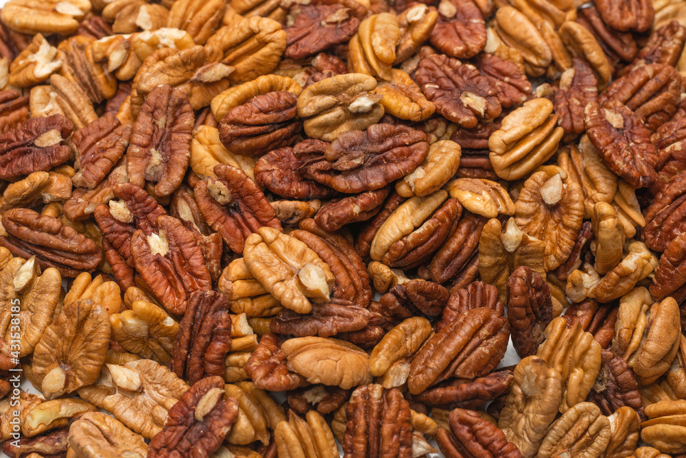 Tasty pecan-nut background. Top view. Tasty pecan-nut background. Top view.