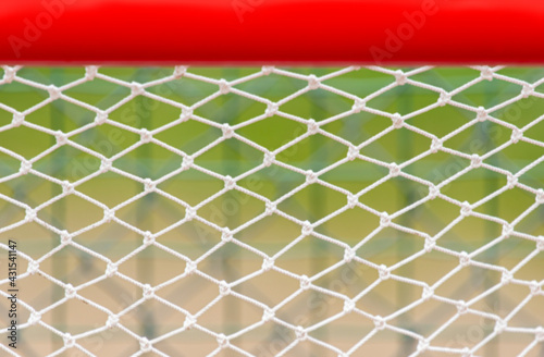 Futsal, lacrosse, soccer, handball net on green background. Professional sport concept