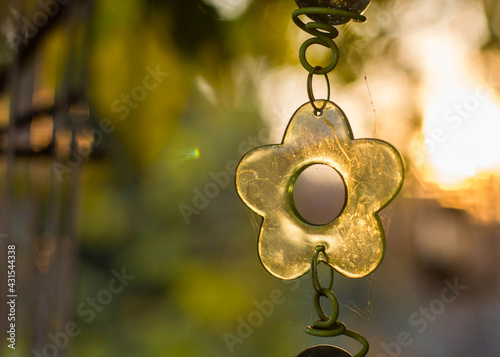 Flower made of glass on light