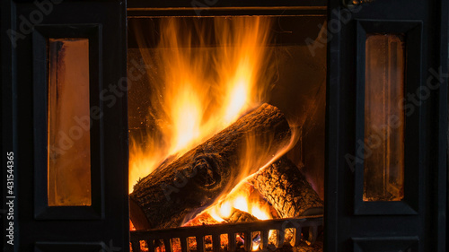 A wood burning in a fireplace