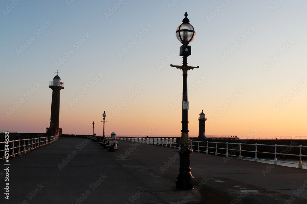 Sunrise on Pier in Whitby, Yorkshire, UK