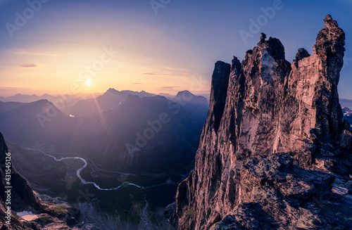 Beautiful mountain landscape with a river against sunset sky background, Trollveggen, Norwegian photo