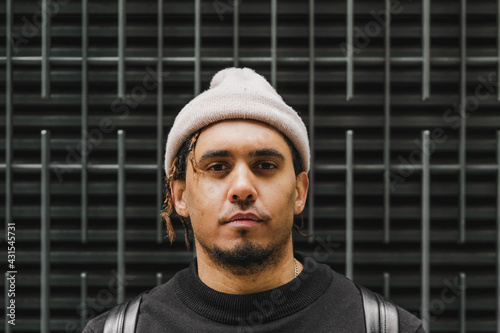 Fotografie Forward facing urban photo of a black man in the inner city of London