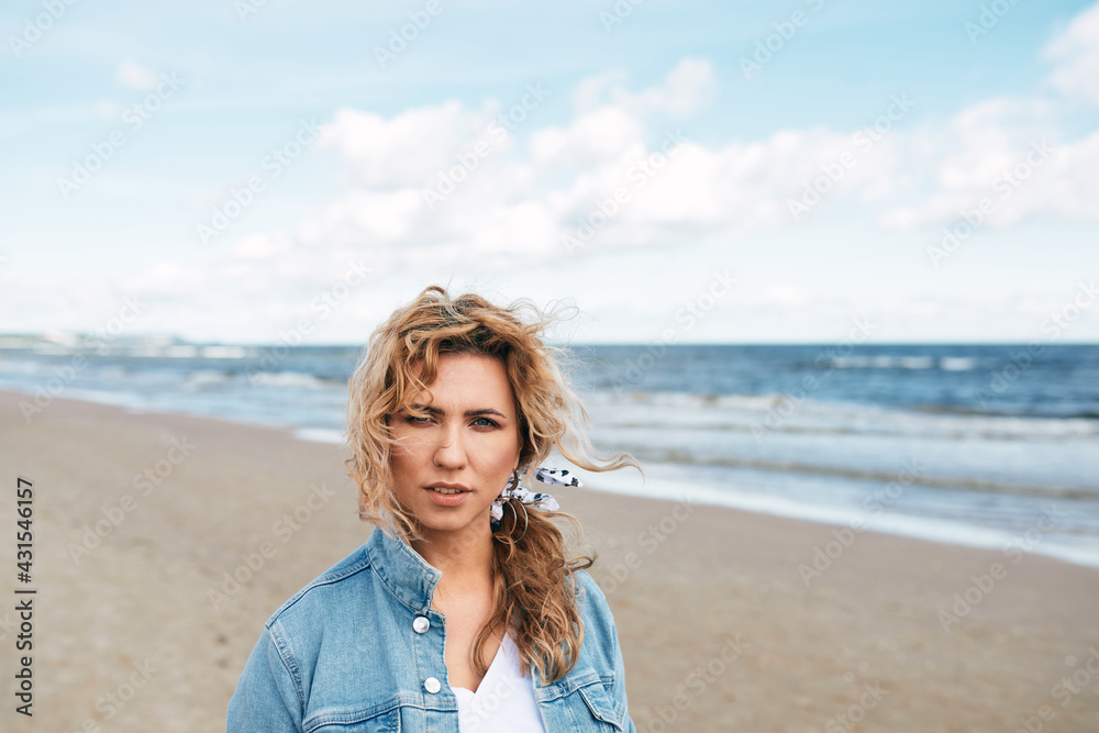 ,BEAUTIFUL NATURAL BLOND GIRL BY THE SEA, BOKEH PORTRAIT, SUNSET ON THE BEACH, denim jacket ,BEAUTIFUL NATURAL BLOND GIRL BY THE SEA, BOKEH PORTRAIT, SUNSET ON THE BEACH, denim jacket