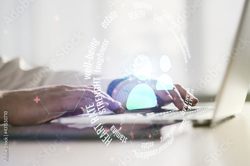 Double exposure of people icons hologram and hands typing on laptop on background. Online insurance service concept