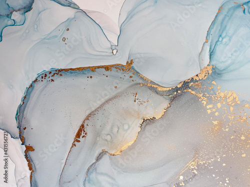 Obraz na plátne Abstract blue art with gold — fluid background with beautiful smudges and stains made with alcohol ink and golden pigment
