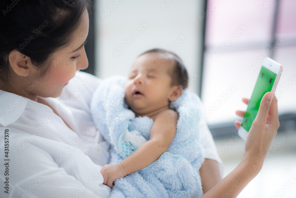 young mother holding child baby with love, family concept of woman and little infant, care happy childhood or motherhood and newborn person, cute girl living at home