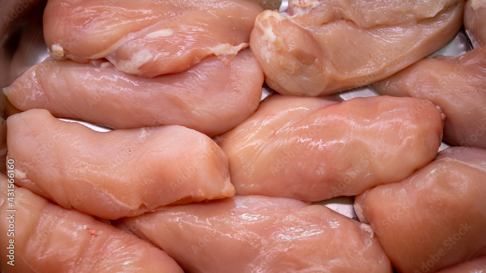 Organic chicken fillets and hallal, close-up Organic chicken fillets and hallal, close-up