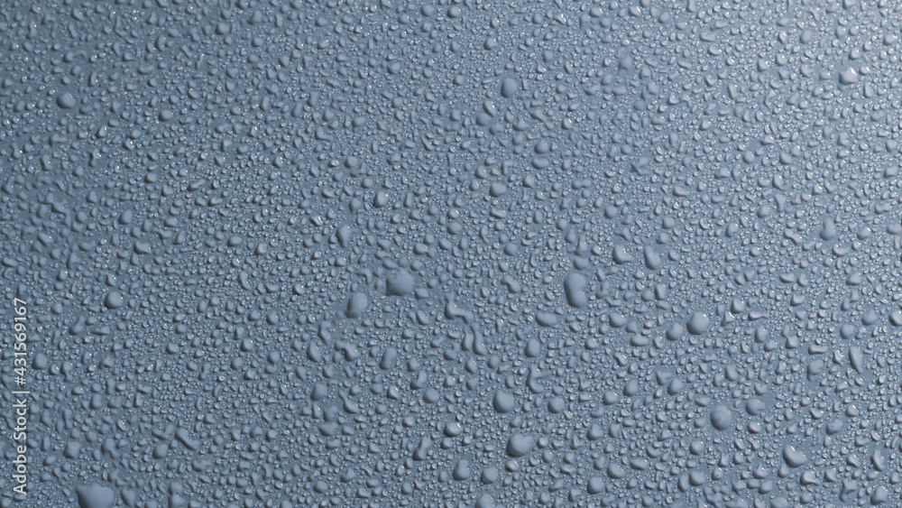 Water drops on a gray surface, a beautiful pattern of water splashes on the background Water drops on a gray surface, a beautiful pattern of water splashes on the background