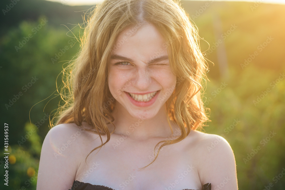 Portrait of young teen girl. Beauty portrait of beautiful smiling female  model. Natural smile. Young smiling woman outdoors portrait. Soft sunny  colors. Close portrait. Stock Photo | Adobe Stock