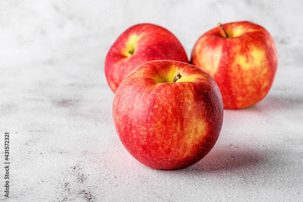 red apples on blackboard or chalkboard background. Bright fruit composition. Close-up on a gray background. red apples on blackboard or chalkboard background. Bright fruit composition. Close-up on a gray background.