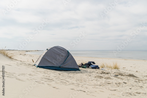 View of a tent on the sandy beach of the Baltic Sea