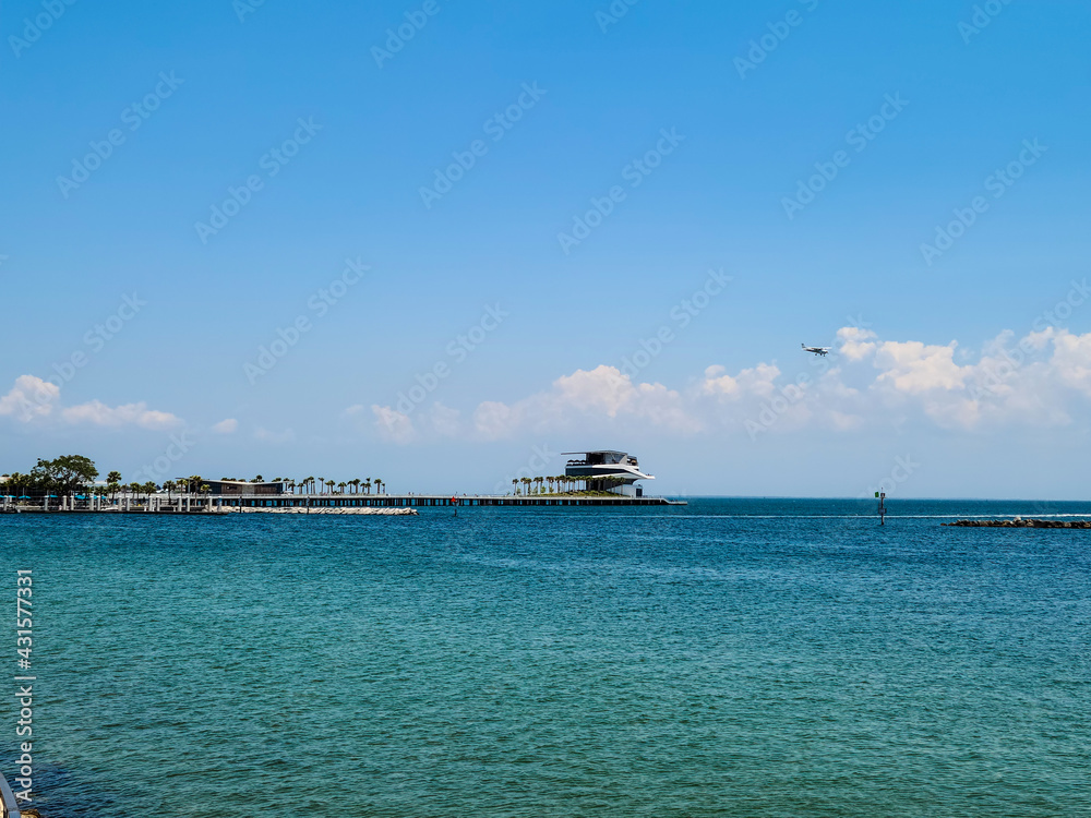 The St. Petersburg Pier, officially known as the St. Pete Pier, is a landmark pleasure pier extending into Tampa Bay from downtown St. Petersburg, Florida, United States. Over the years several differ