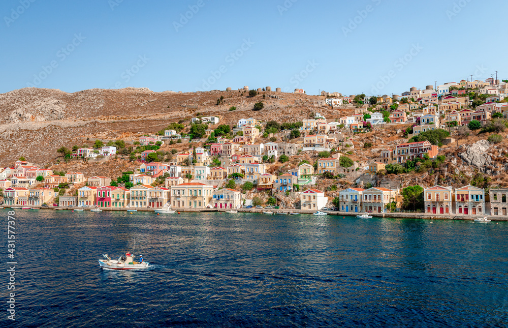 View of Symi, a village and a tiny island of Dodecanese, that amazes visitors with the calm atmosphere and the fabulous architecture.