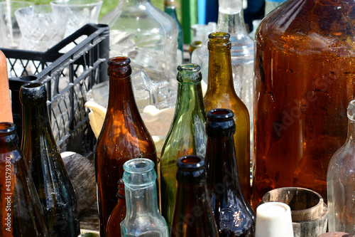 Beautiful glass bottles of different colors. 