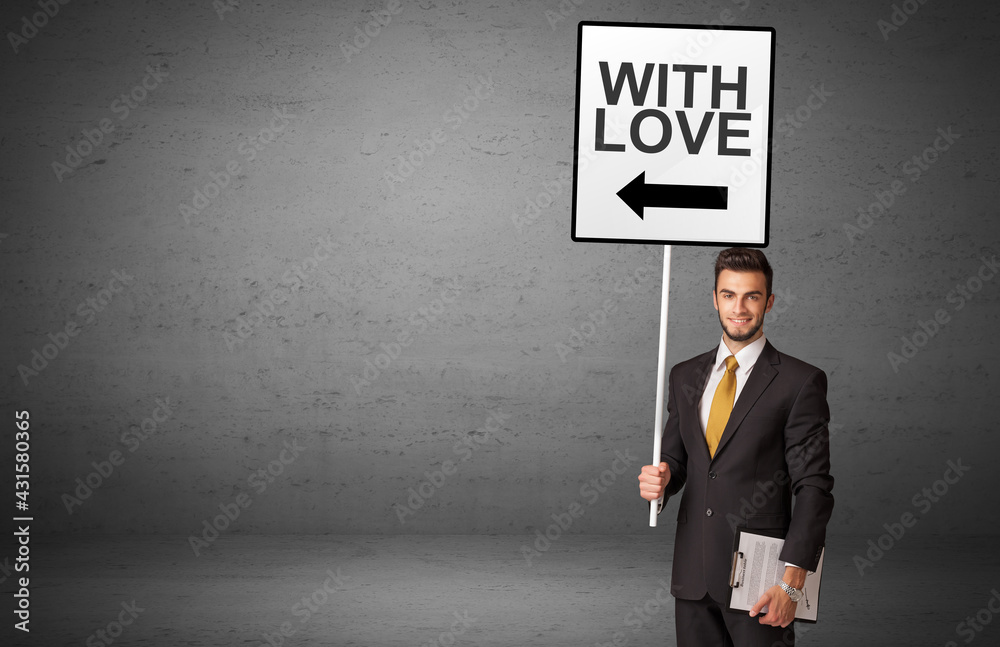 business person holding a traffic sign business person holding a traffic sign
