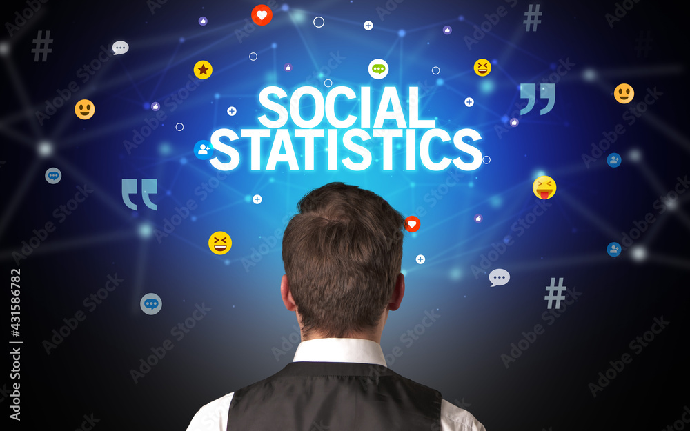 Rear view of a businessman, social media concept Rear view of a businessman, social media concept