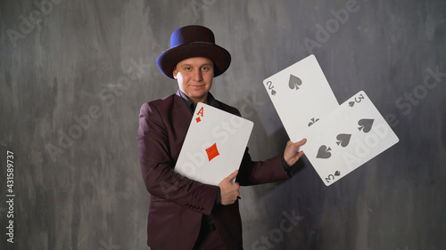 Photography Magician With Playing Cards And Hat. Magician with playing cards.