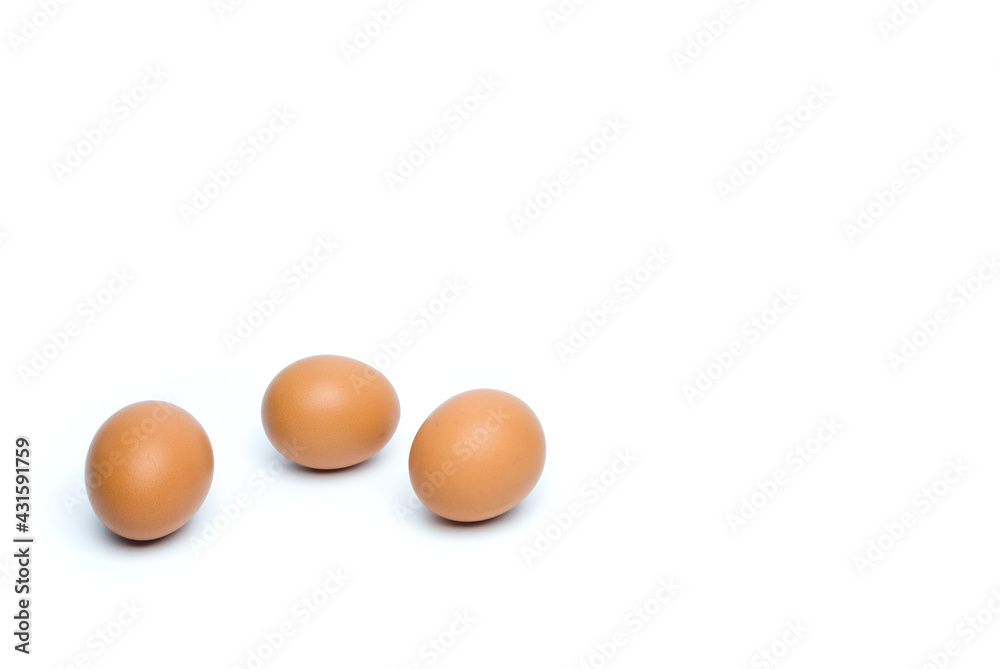 Brown chicken eggs are isolated on a white background Brown chicken eggs are isolated on a white background