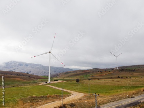 Electricity Wind turbine landscape. Wind farm energy ecofriendly in mountains. Renewable clean energy production for green ecological world