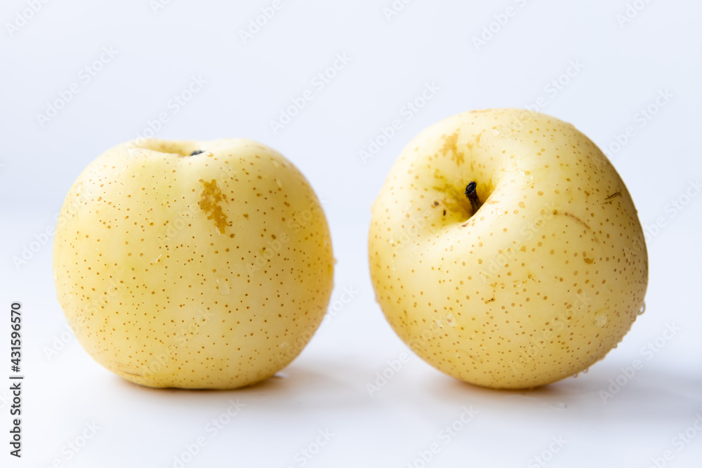 Two Korean pears isolated with a white background Two Korean pears isolated with a white background