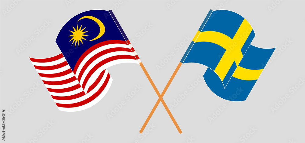 Crossed and waving flags of Malaysia and Sweden Crossed and waving flags of Malaysia and Sweden
