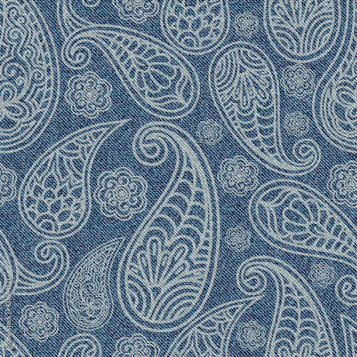 Jeans seamless pattern with Indian paisley ornament. Turkish cucumber on blue Denim texture background.