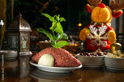 Traditional Middle Eastern food. Lebanese food. Arabian raw kibbeh, christmas decoration