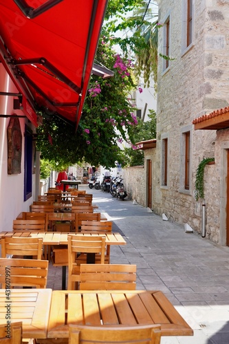 Bodrum, Turkey - August, 2020: Atmospheric street cafe in Turkey. Daily atmosphere in Turkey