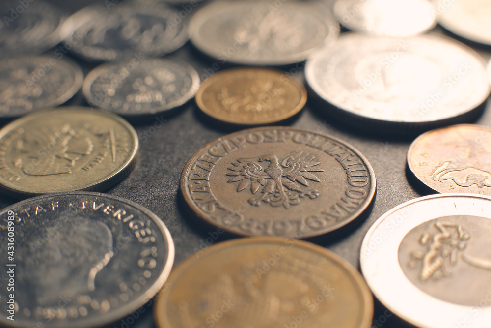 Many coins on a black background. Close up Many coins on a black background. Close up