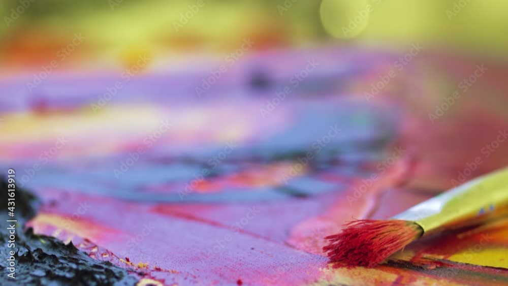 abstract used brush on an artistic painting. rack focus abstract used brush on an artistic painting. rack focus