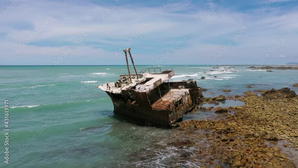 Rusty shipwreck in Agulhas National Park shore, South Africa - Aerial Rusty shipwreck in Agulhas National Park shore, South Africa - Aerial