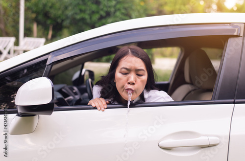 Woman puke or vomiting on window in car,Car Sick and motion sickness