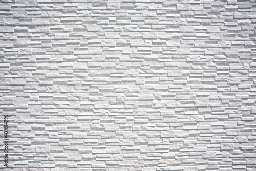 白い石目調壁