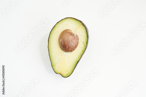 Organic fresh green avocado white background