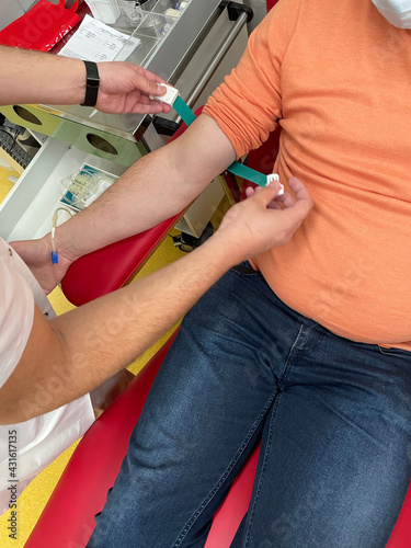 Close up nurse hand collecting blood sample for diagnosis covid-19, Coronavirus.