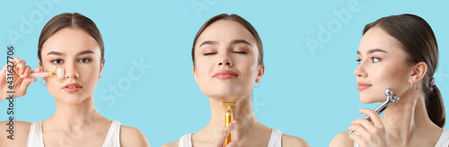 Young woman with facial massage tool on color background