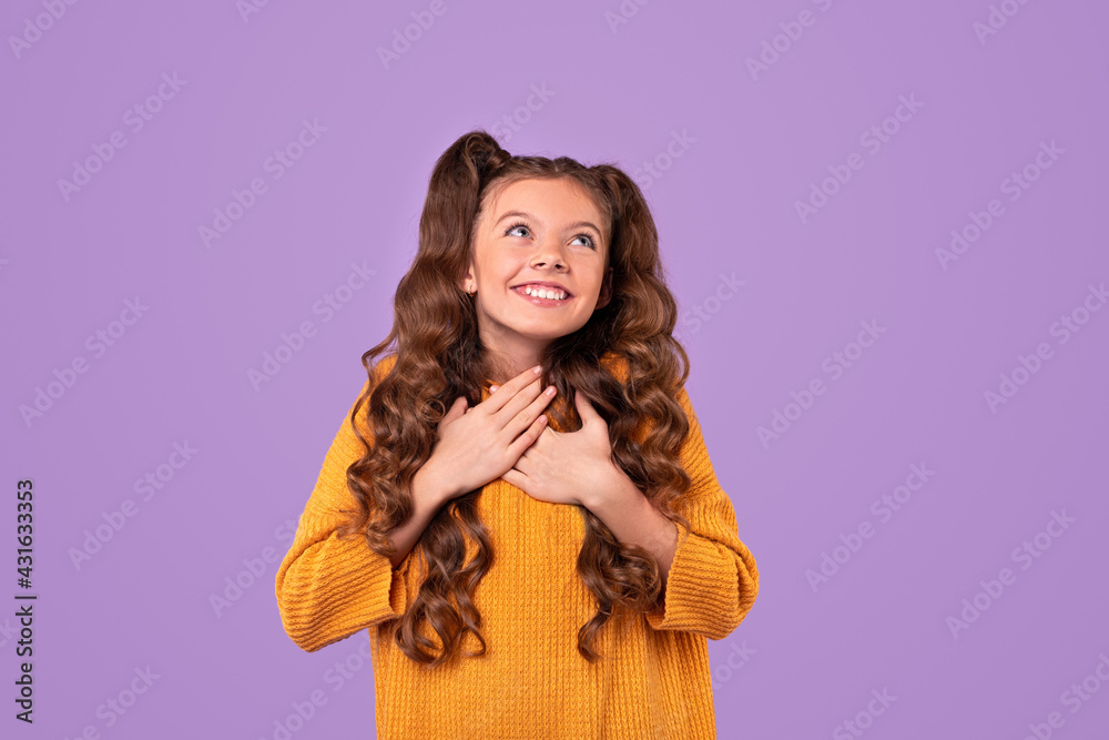 Dreamy girl with hands on chest Dreamy girl with hands on chest