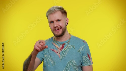 Wallpaper Mural Hey you. Bearded adult guy smiling excitedly, pointing to camera, beauty choosing lucky winner, indicating to awesome you. Young fashionable tourist man studio shot isolated on yellow wall background Torontodigital.ca