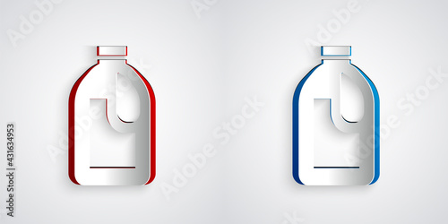 Paper cut Plastic bottle for laundry detergent, bleach, dishwashing liquid or another cleaning agent icon isolated on grey background. Paper art style. Vector