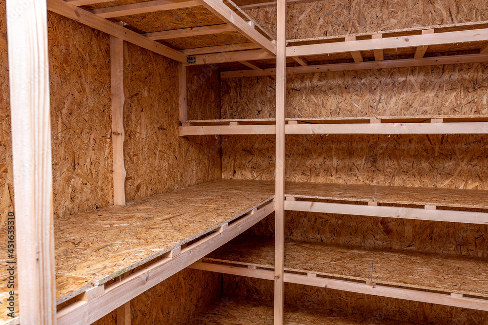OSB racks, shelves are designed for storing things. Dressing room in the house. Organization of spaces in the house. Shelves in the garage. OSB racks, shelves are designed for storing things. Dressing room in the house. Organization of spaces in the house. Shelves in the garage.