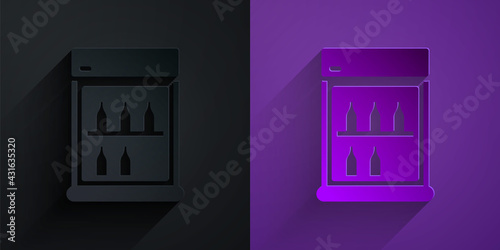 Paper cut Commercial refrigerator to store drinks icon isolated on black on purple background. Perishables for store or supermarket. Paper art style. Vector