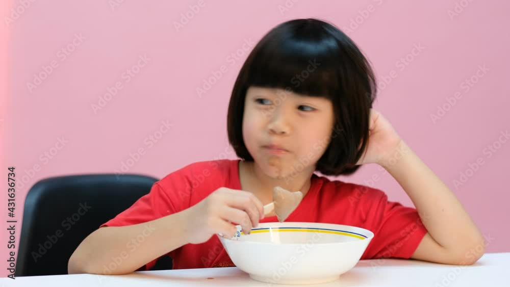 kid eating ice cream, delicious and happy concept
kid eating ice cream, delicious and happy concept