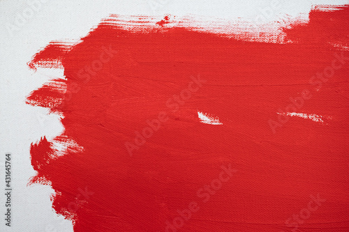 Close up Texture Red color paint on white colour canvas Brush marks stroke for paper graphic design on background