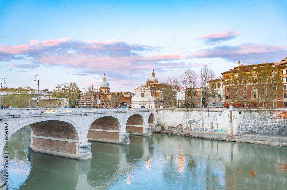 Rome city view with tiber river at dusk