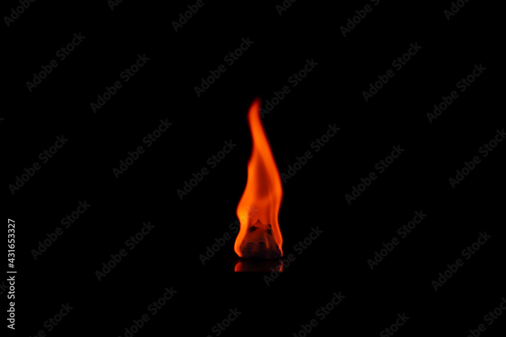 The flame on the black background